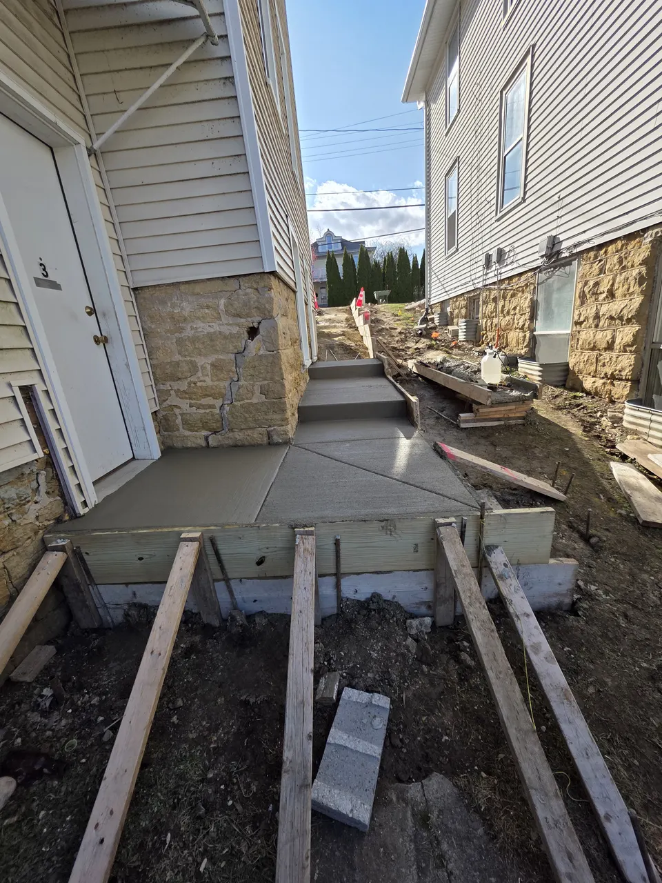 Newly poured concrete stairs after repair, Edgerton WI